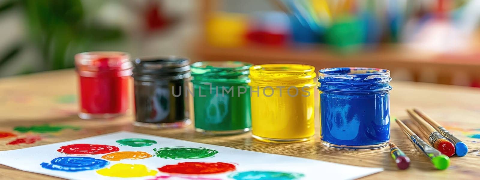 close up of paints on the table. Selective focus.
