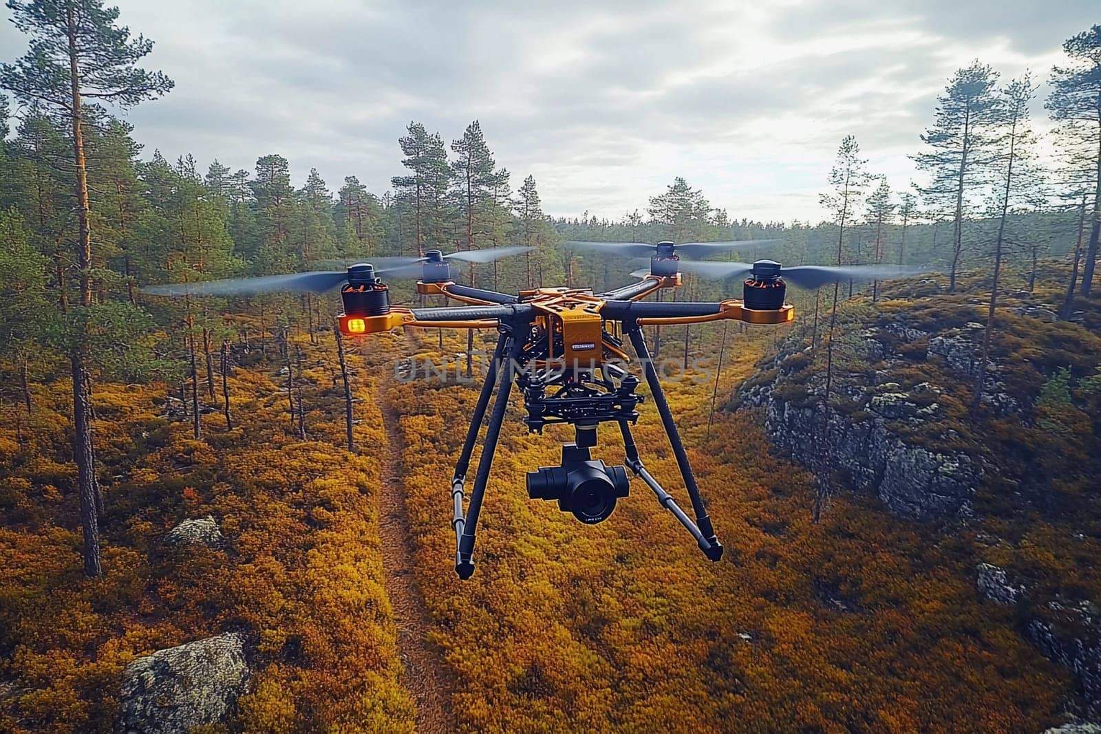 A drone navigates through a colorful autumn landscape, showcasing a mix of golden foliage and rugged terrain beneath a cloudy sky.