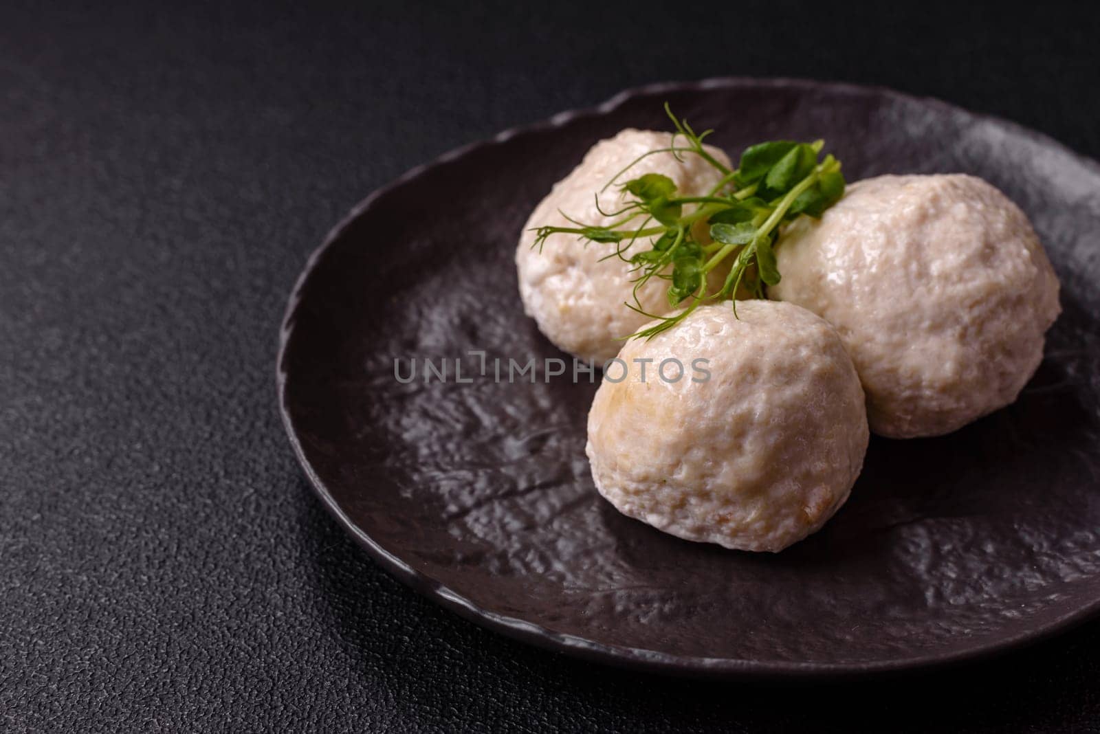 Delicious healthy steamed chicken cutlets or minced meatballs. Diet food dish