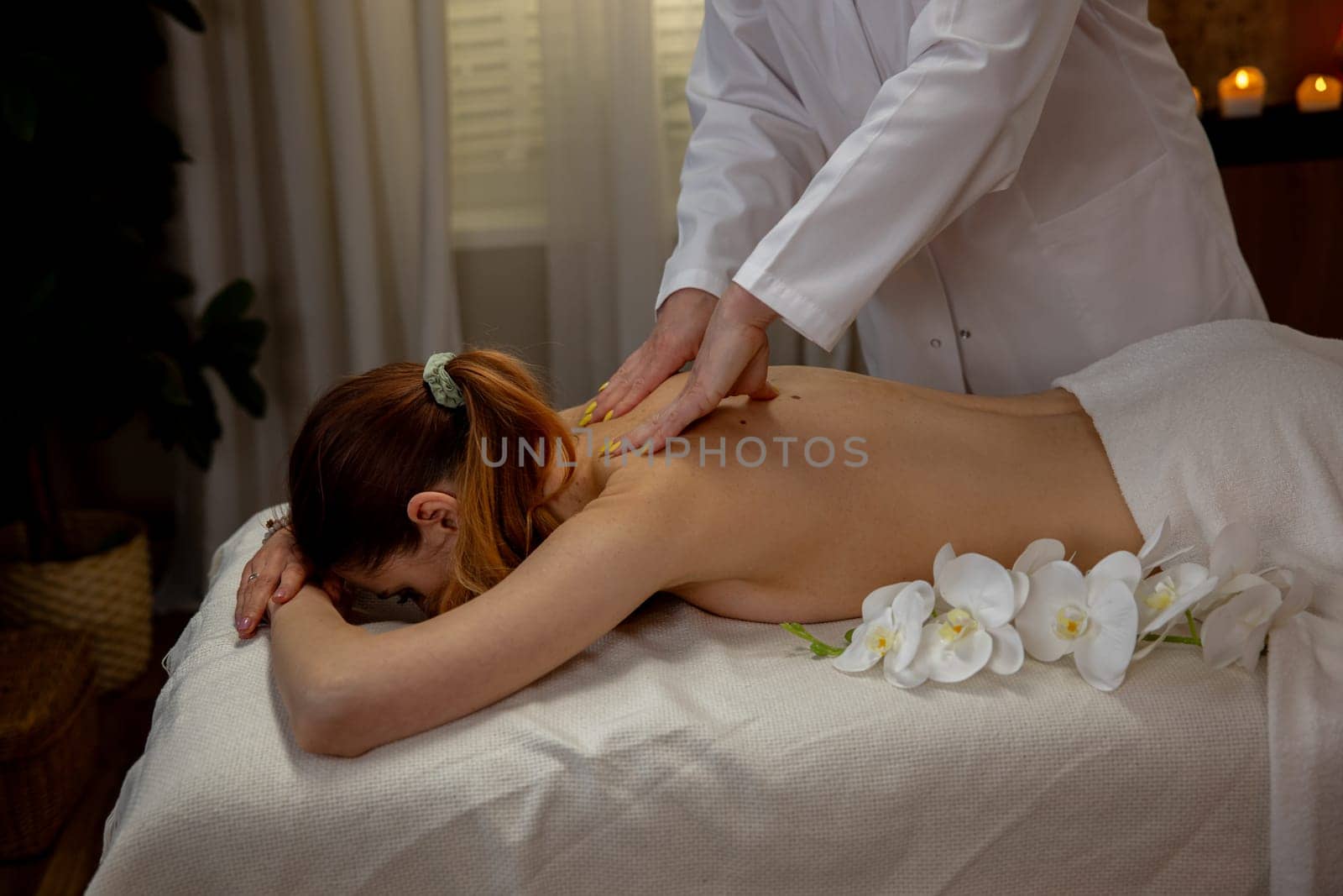 Enjoy a revitalizing massage therapy session with floral accents that promotes relaxation and wellness