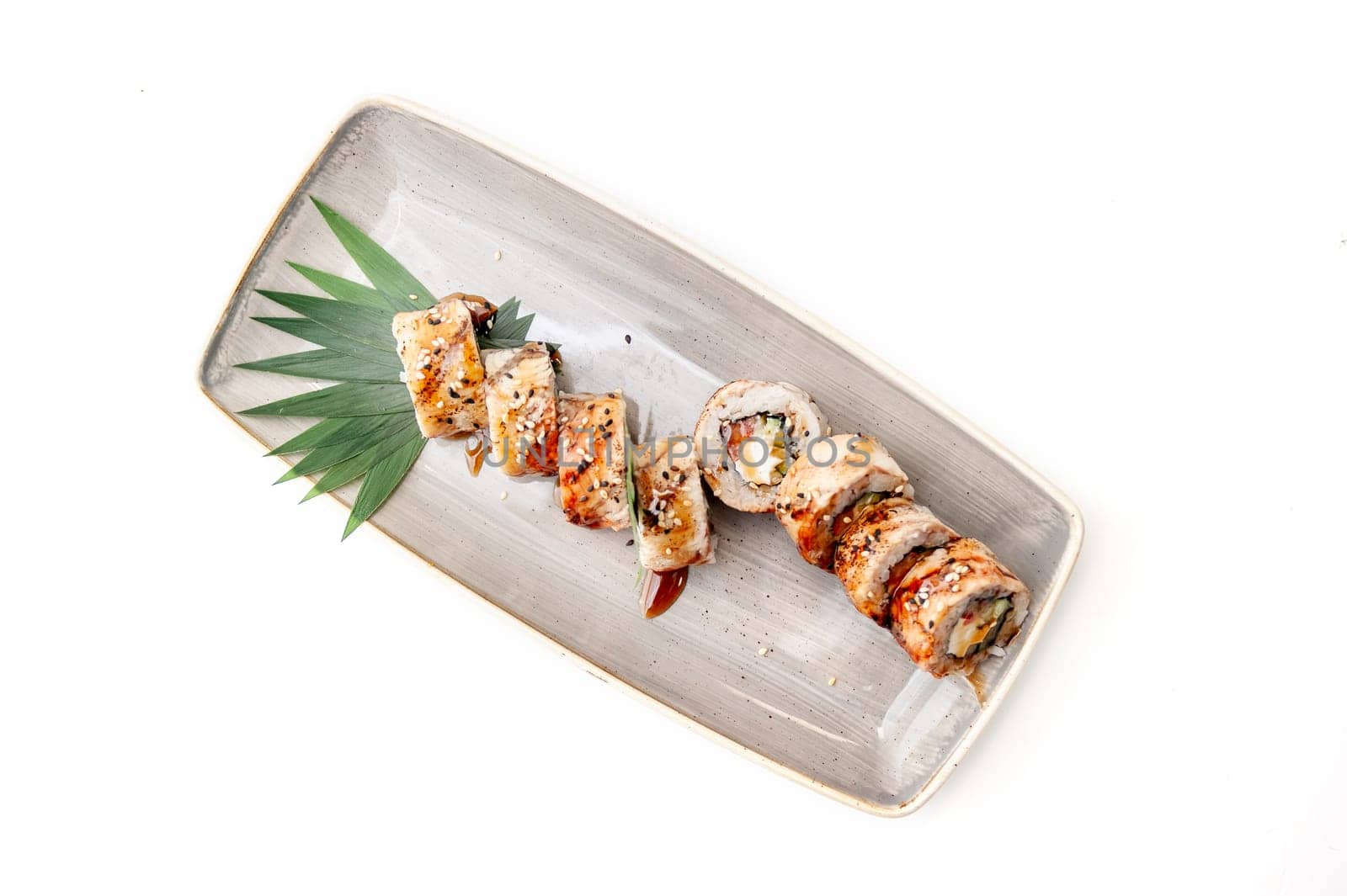 American Canada sushi rolls with unagi and salmon isolated. High quality photo