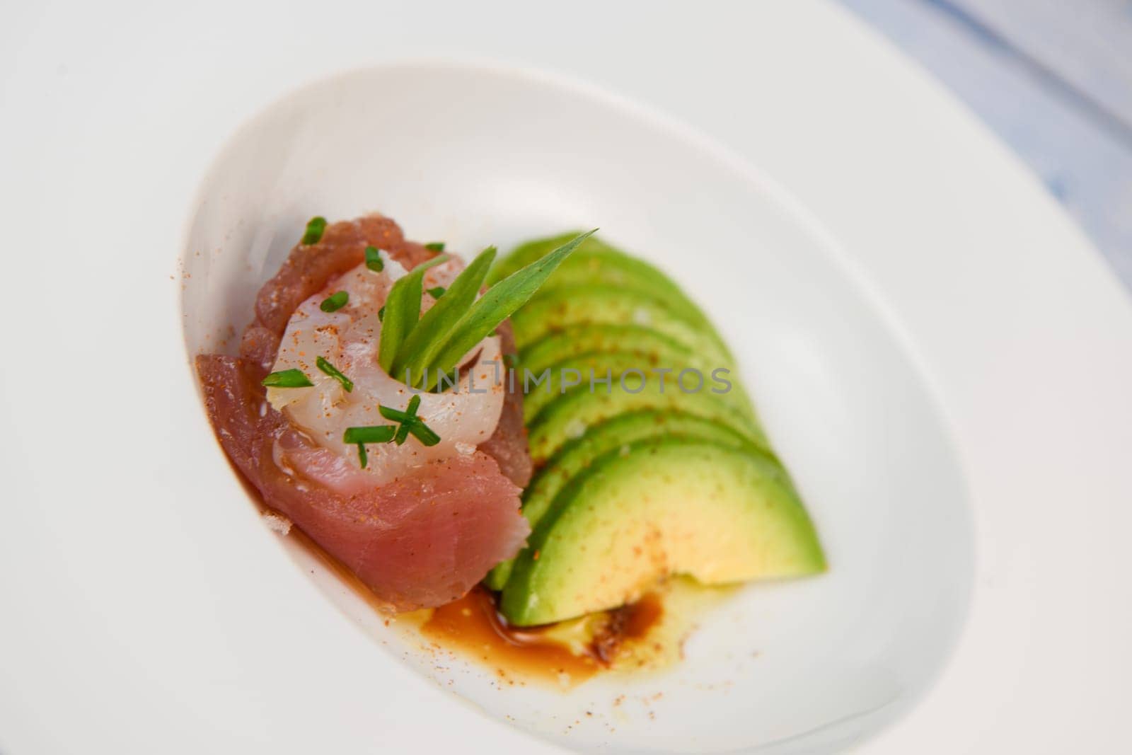 FISH CEVICHE RECIPE, SEA BREAM AND TUNA, AVOCADO, BELL PEPPER, CHILLI, CHIVES, LEMON, OLIVE OIL, BLUE POPPY SEEDS, SALT, High quality photo