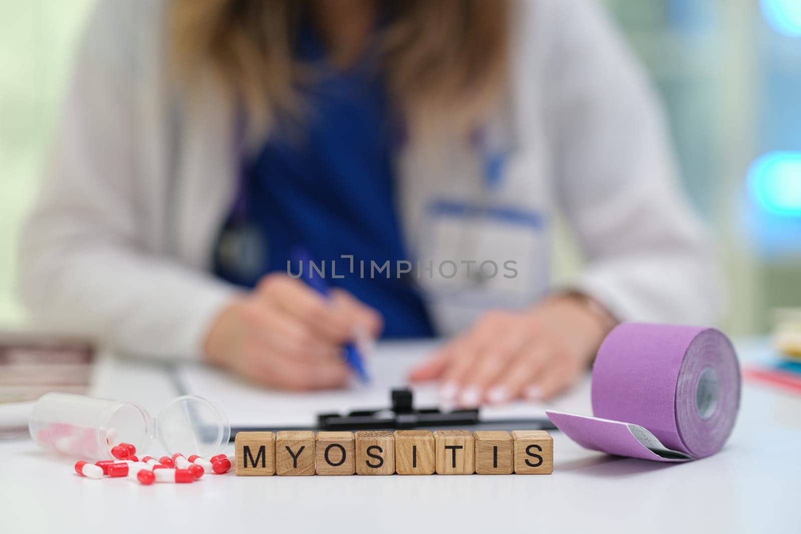 A healthcare professional examines myositis, focusing on accurate diagnosis and exploring therapy options