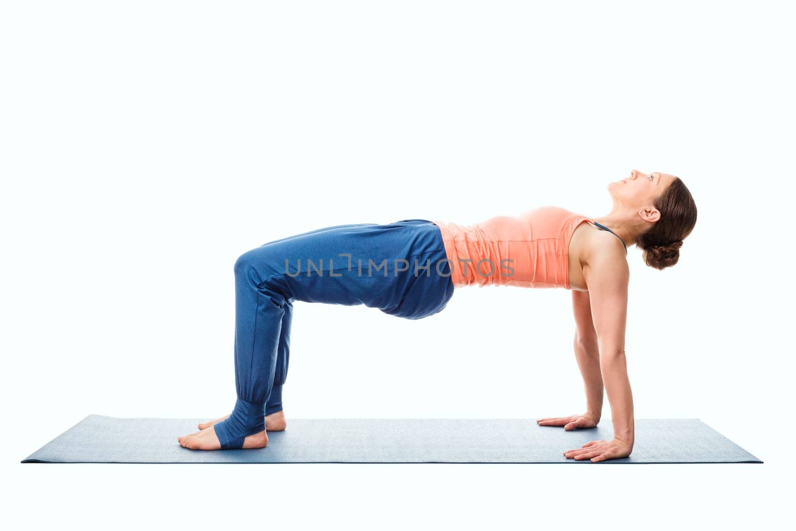 Woman doing Ashtanga Vinyasa Yoga asana Purvottanasana - upward-facing plank pose posture easy variation isolated on white background