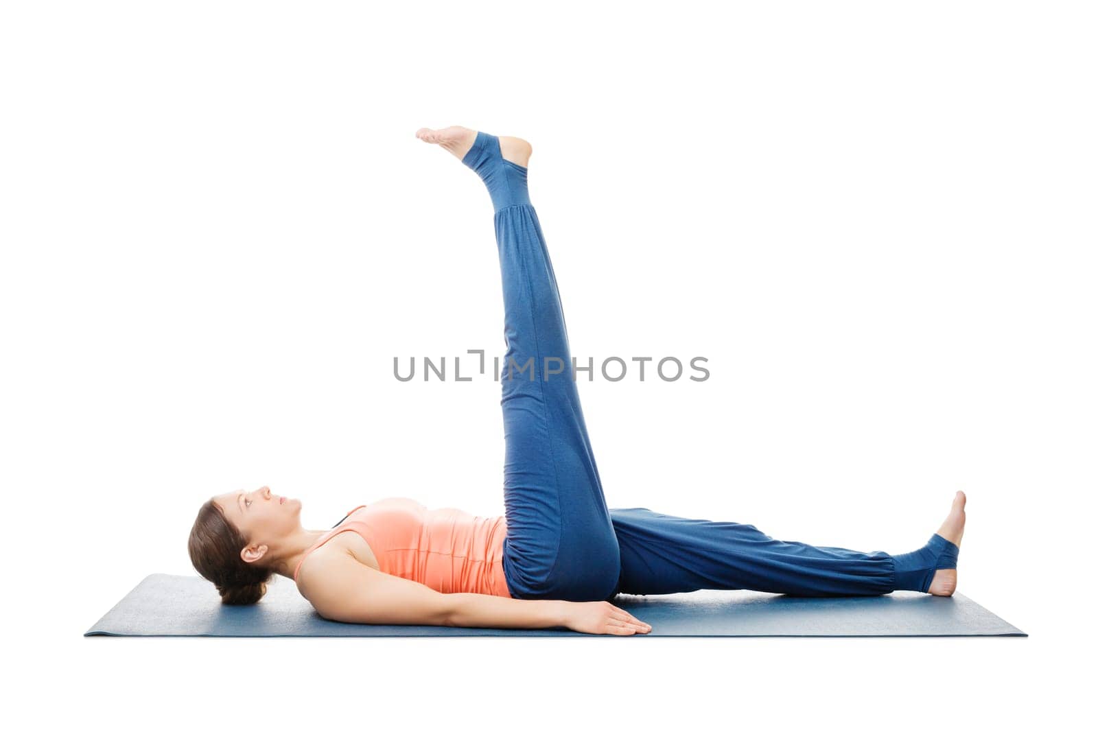 Woman doing yoga asana Uttanpadasana by dimol