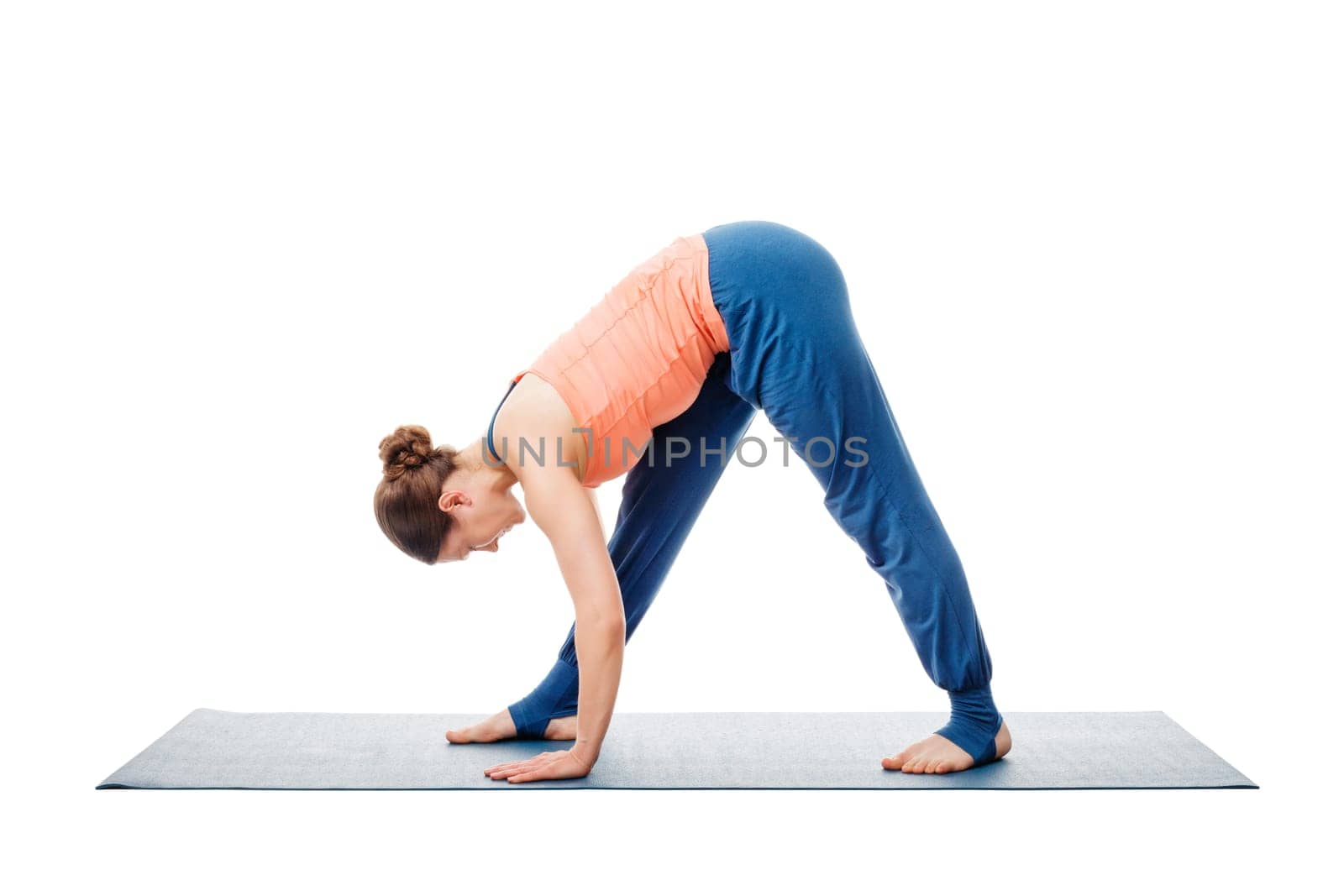 Woman doing Ashtanga Vinyasa Yoga asana Parsvottanasana by dimol