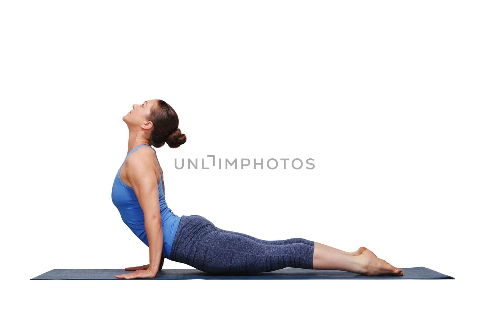 Woman doing Ashtanga Vinyasa yoga Sun Salutation asana by dimol