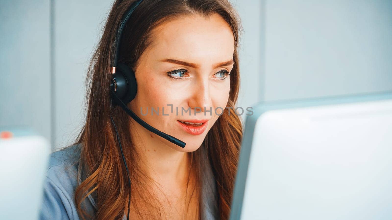 Business people wearing headset working in office Jivy by biancoblue