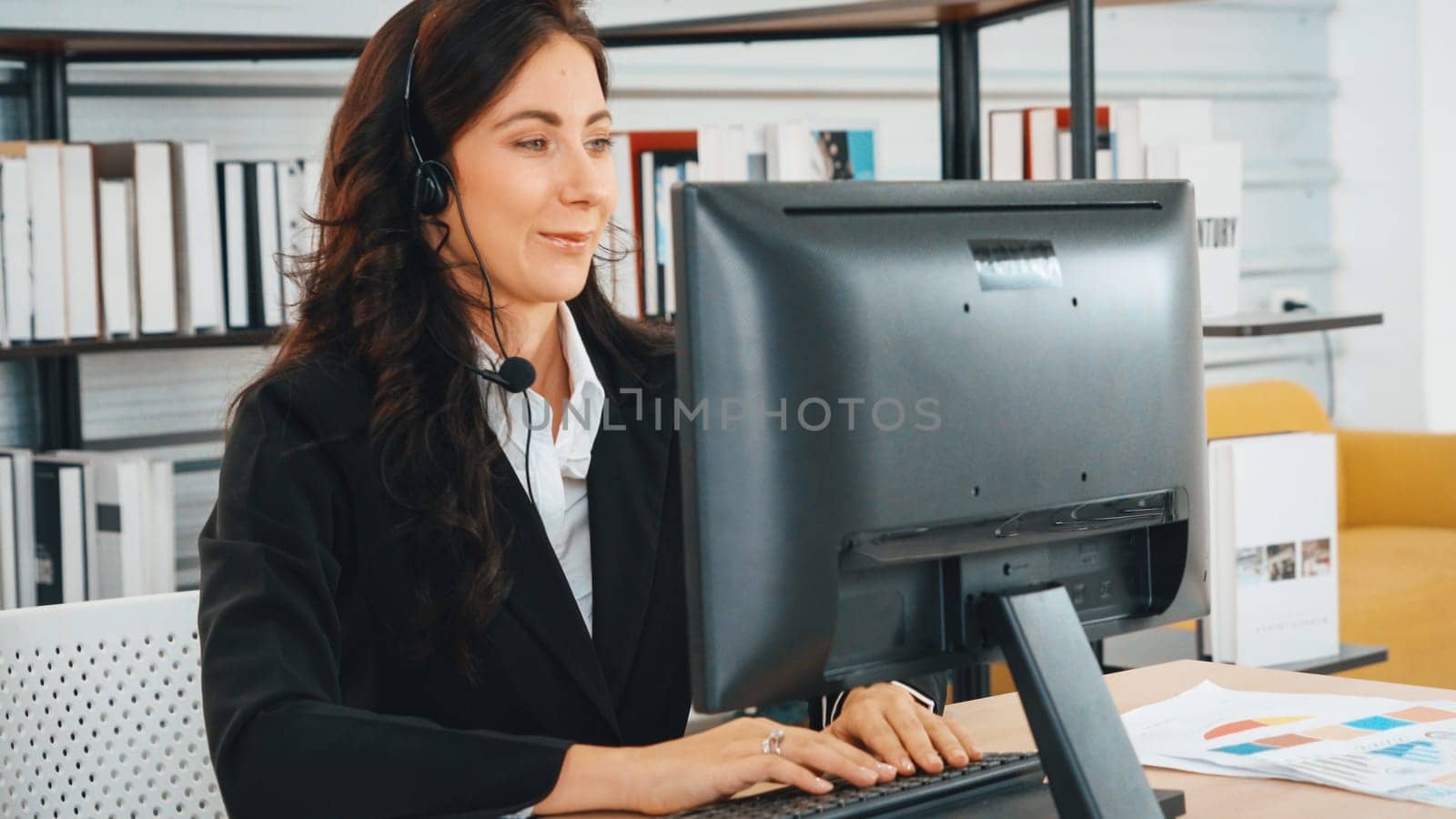 Business people wearing headset working in office Jivy by biancoblue