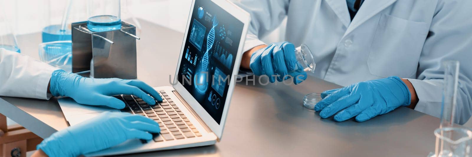 Scientist working on biotechnology computer software to study DNA. Neoteric by biancoblue