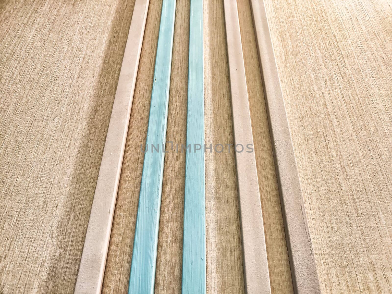 This visually appealing surface features alternating blue and beige stripes, providing a perfect backdrop for creative text arrangements and designs.