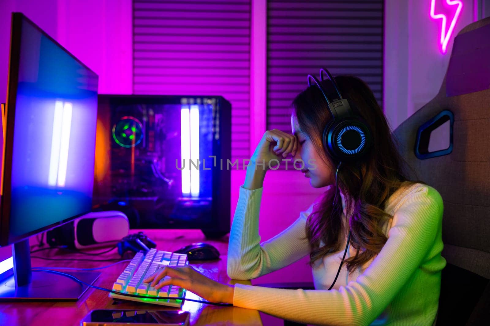 Game losing. Angry Gamer fail plays online video games tournament with computer, Unhappy upset woman wear gaming headphones she lose after playing live stream games online feel depressed at home