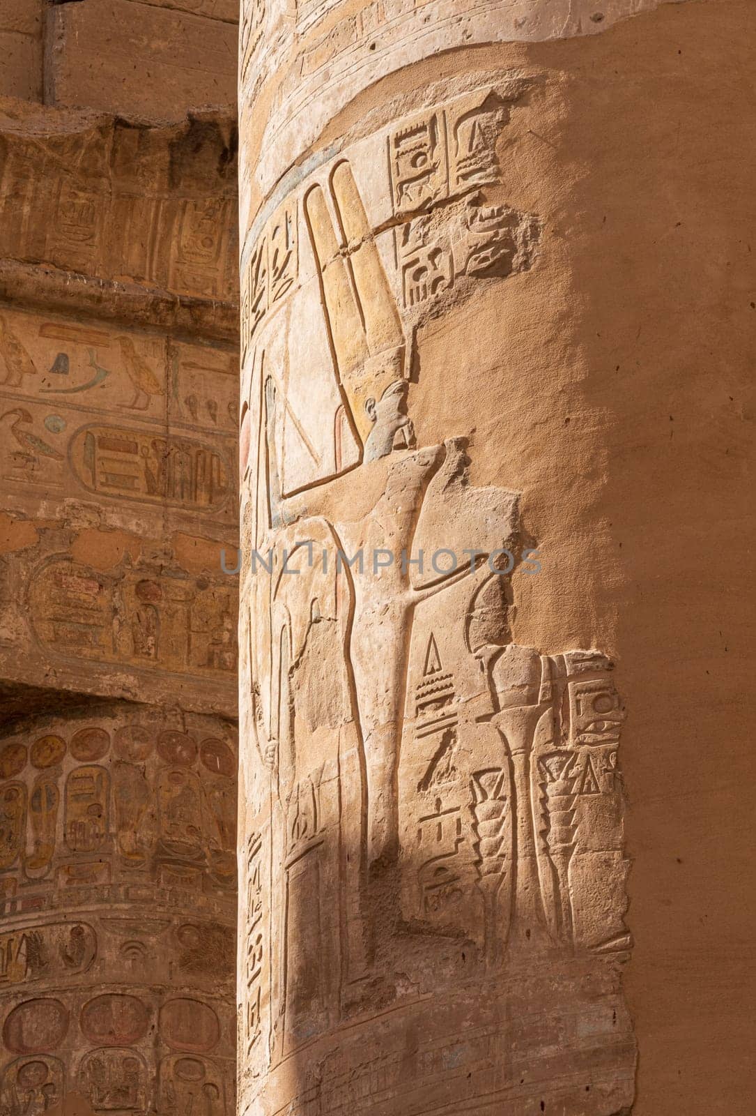 Detail of the carvings on the numerous stone columns supporting roof of Karnak Temple near Luxor