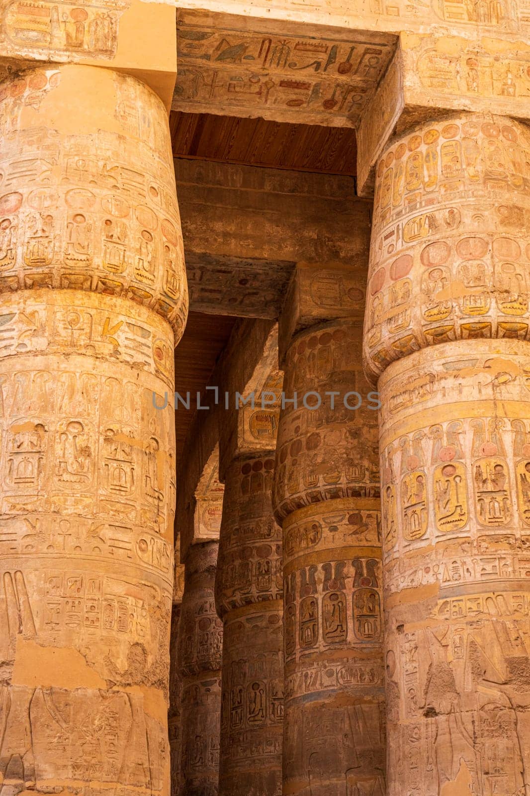 Detail of the carvings on the numerous stone columns supporting roof of Karnak Temple near Luxor