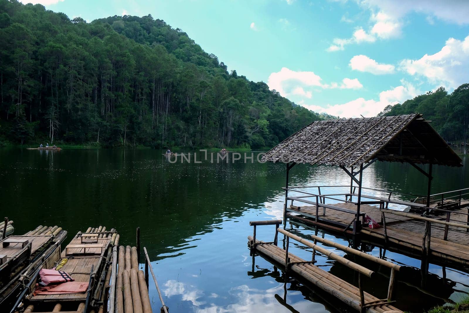 Bamboo rafts on the lake in the Pang Tong Under Royal Forest Park ( Pang Ung ), Mae Hong Son, Thailand. Pang Ung is a popular place to stay in a camping in the winter.