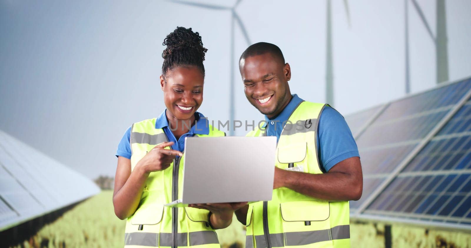 Photovoltaic Energy Engineers Woman And Man With Laptop