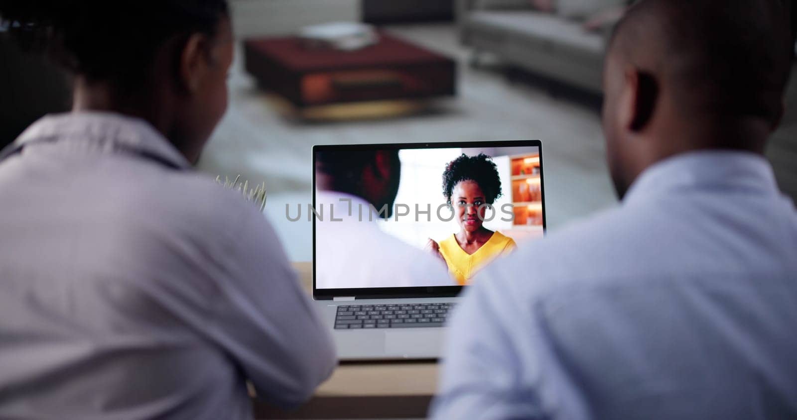 Couple Watching Television Show On Laptop Computer
