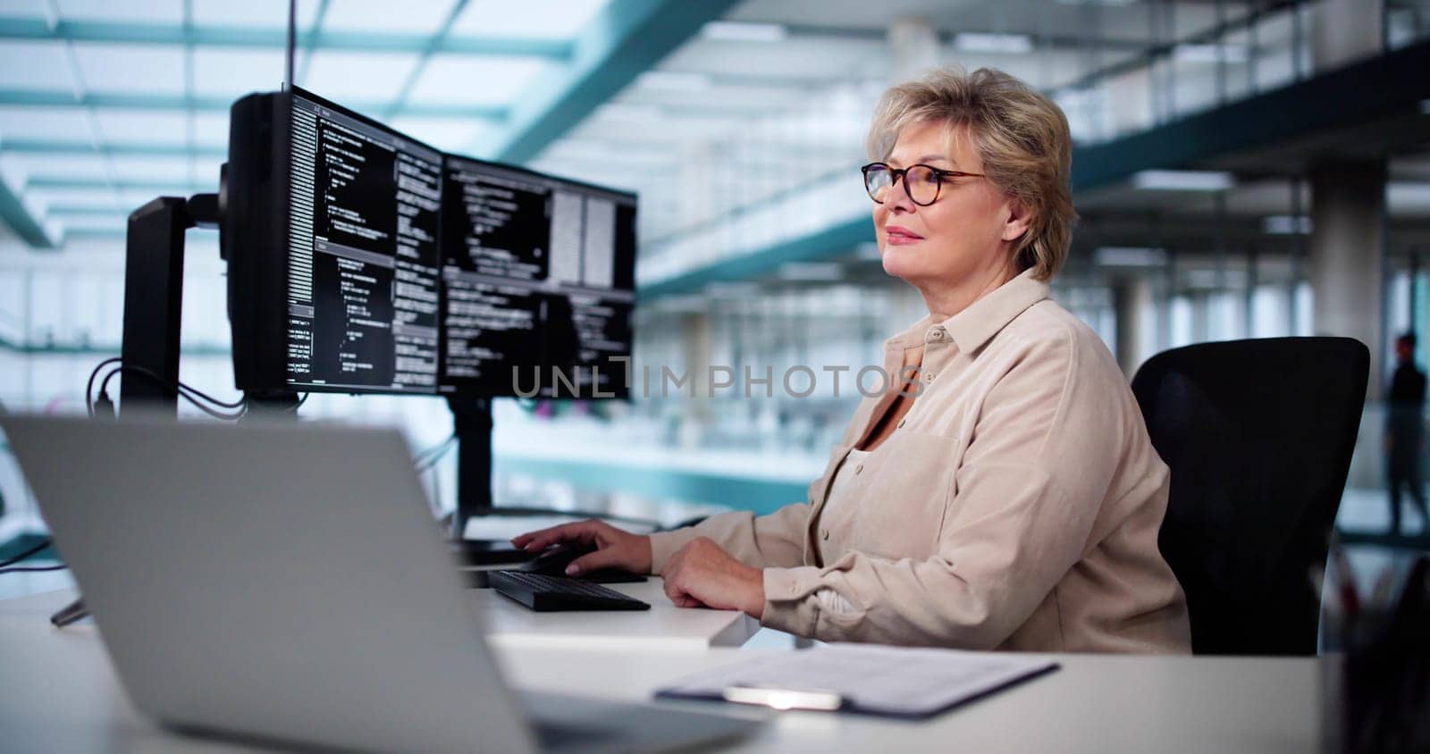 Software Programmer Or Coder Woman Using Office Computer