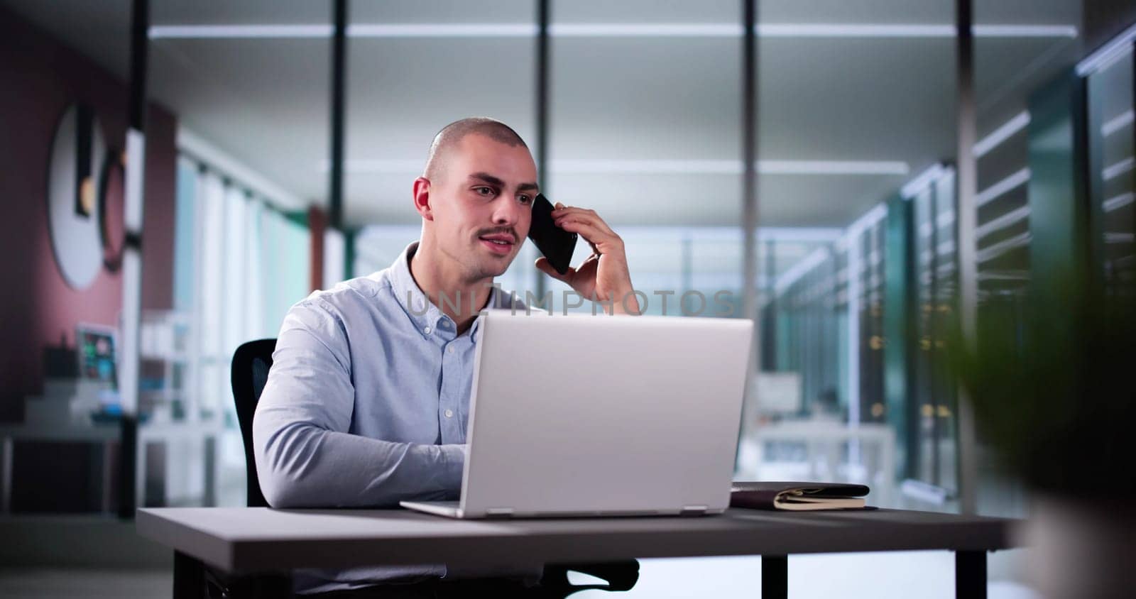 Businessman Utilizing Smartphone To Check Online House Listing Contact At Corporate Office, Real Estate Agent At Work.