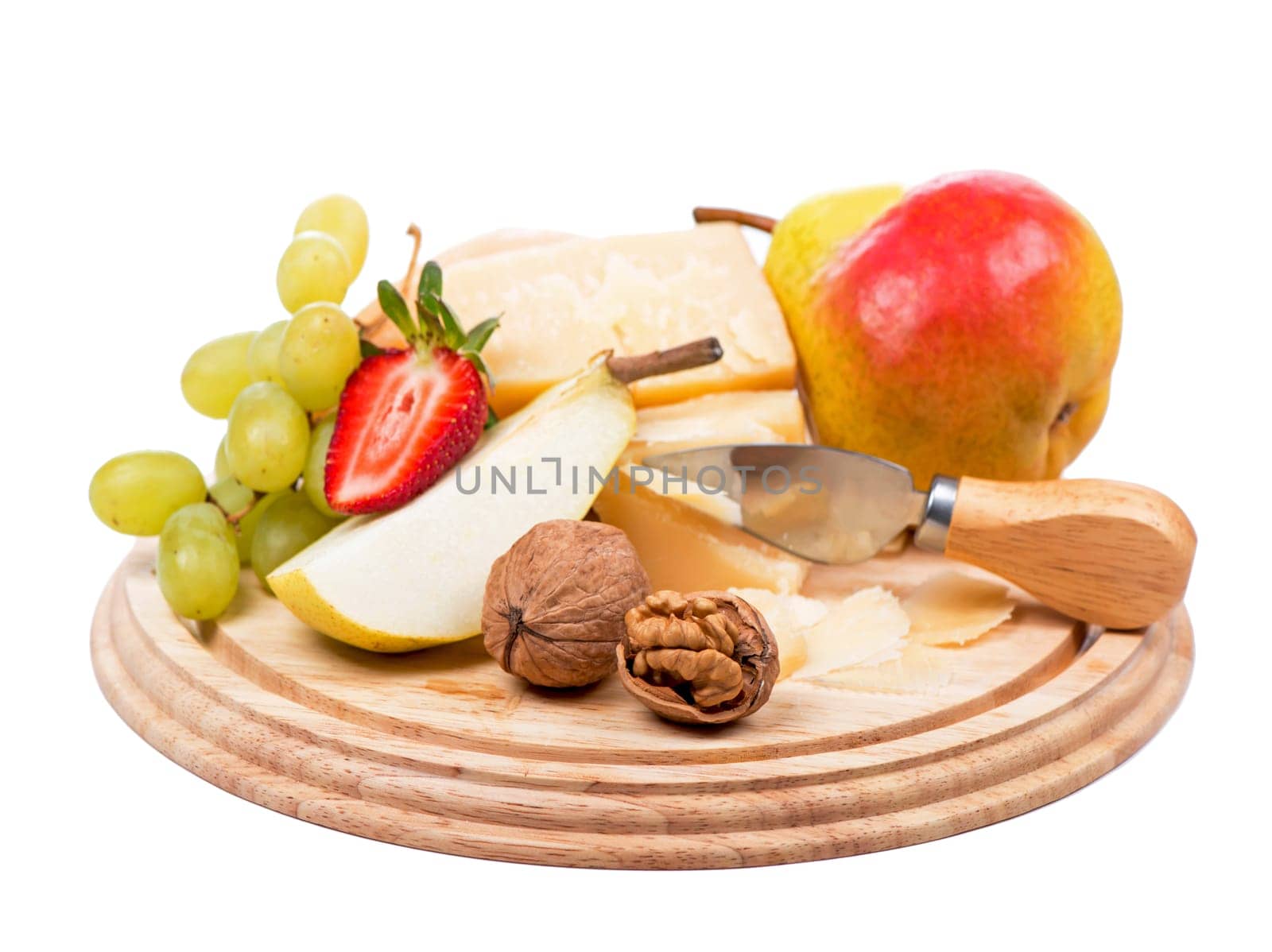 cheese and fruit. parmesan cheese, nuts and ripe pears on a wooden board on a white background by aprilphoto
