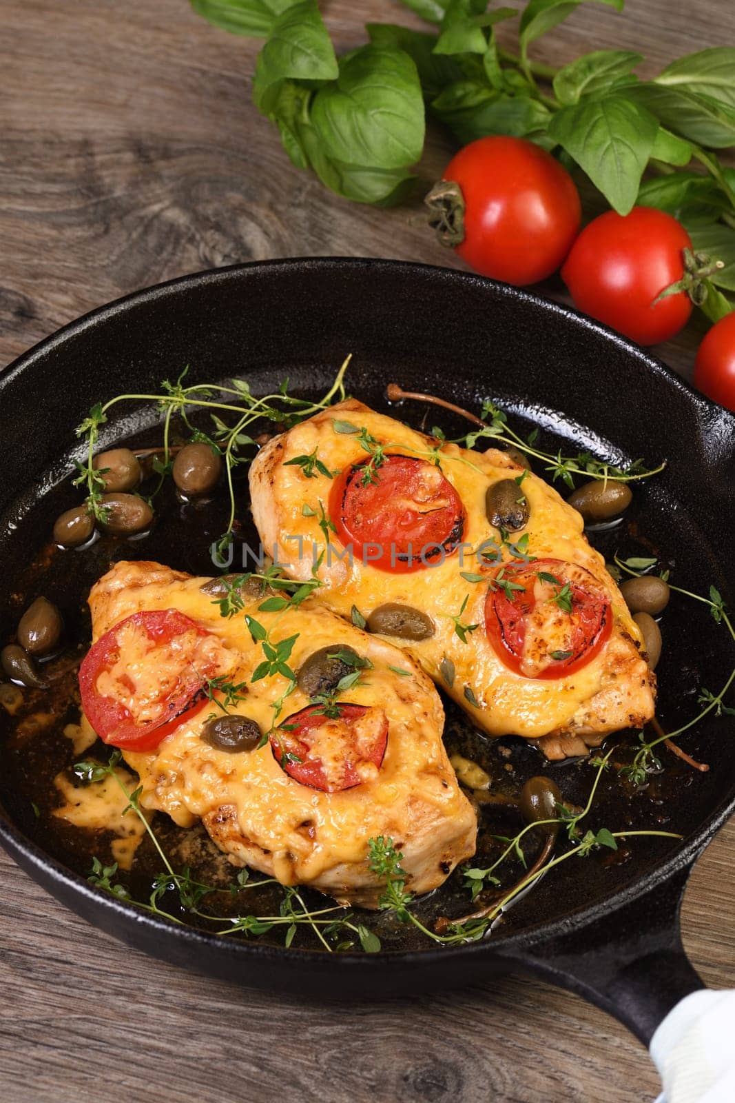 Chicken breast with cheese and tomatoes by Apolonia