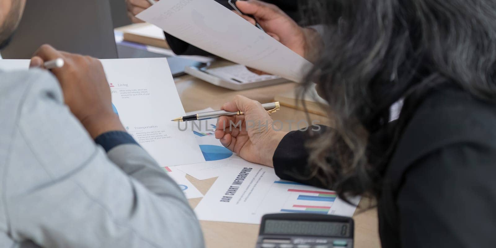 Business meeting to analysis and discuss the situation on the financial report in the meeting room. Investment Consultant, Financial advisor and accounting concept.