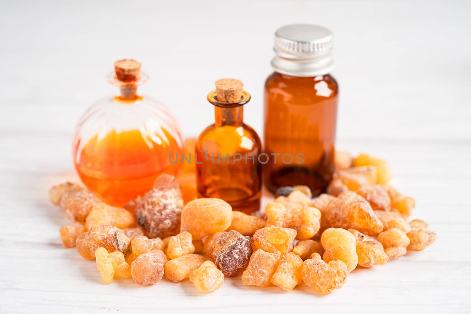 Frankincense or olibanum aromatic resin isolated on white background used in incense and perfumes.