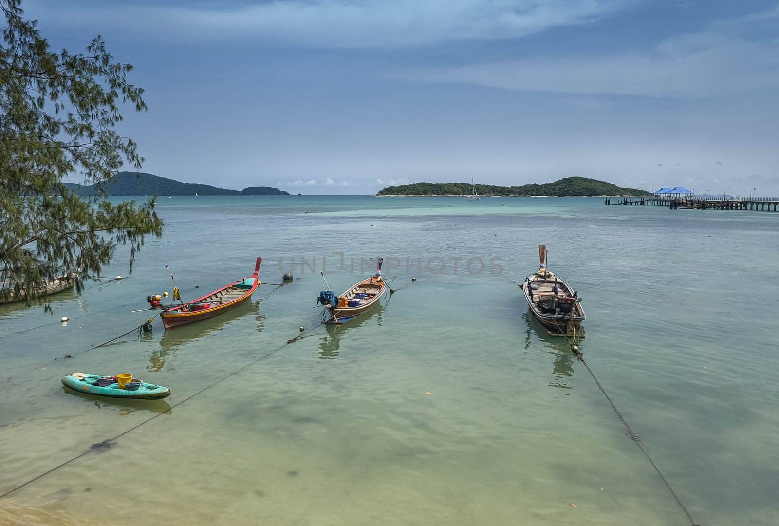 Fishing boats in Phuket, Thailand by Elenaphotos21