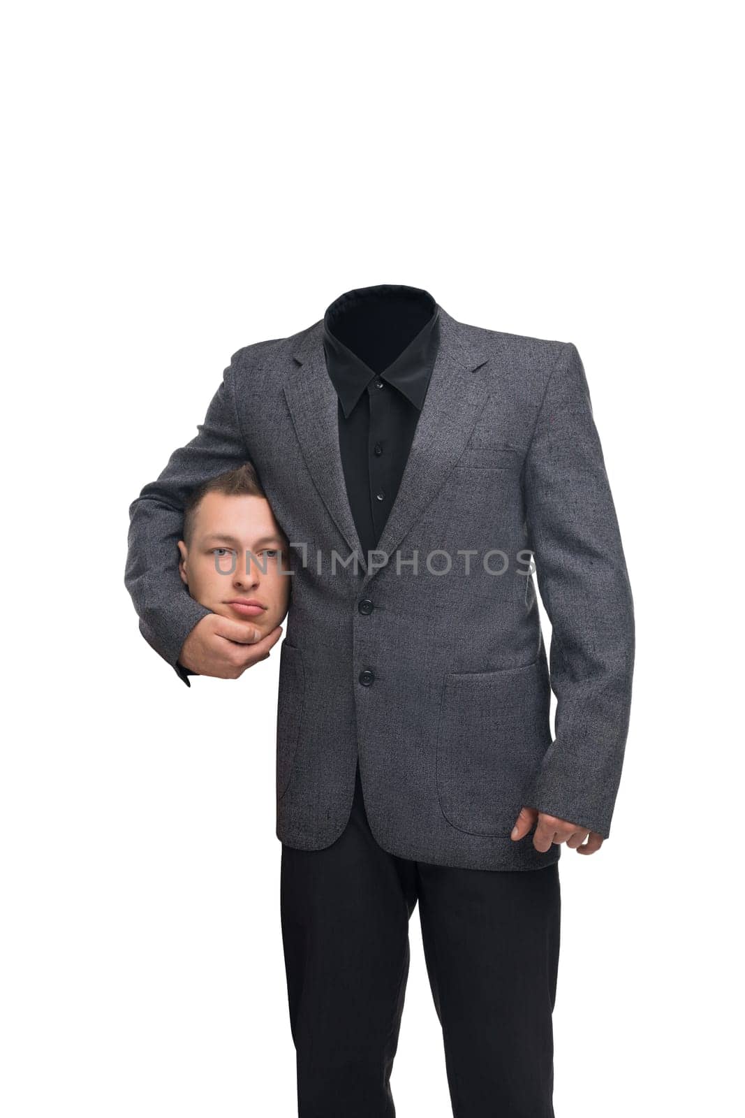 Man in office clothes holding his head under his arm amaising illusion isolated shot