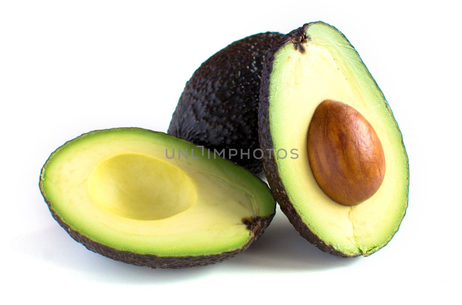 A fresh avocado cut in half