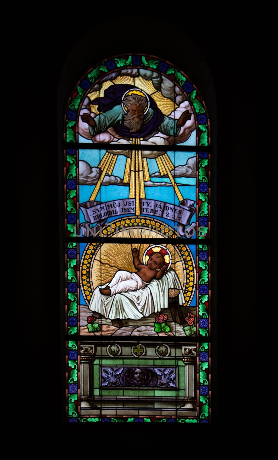 Lights come through the stained glass window