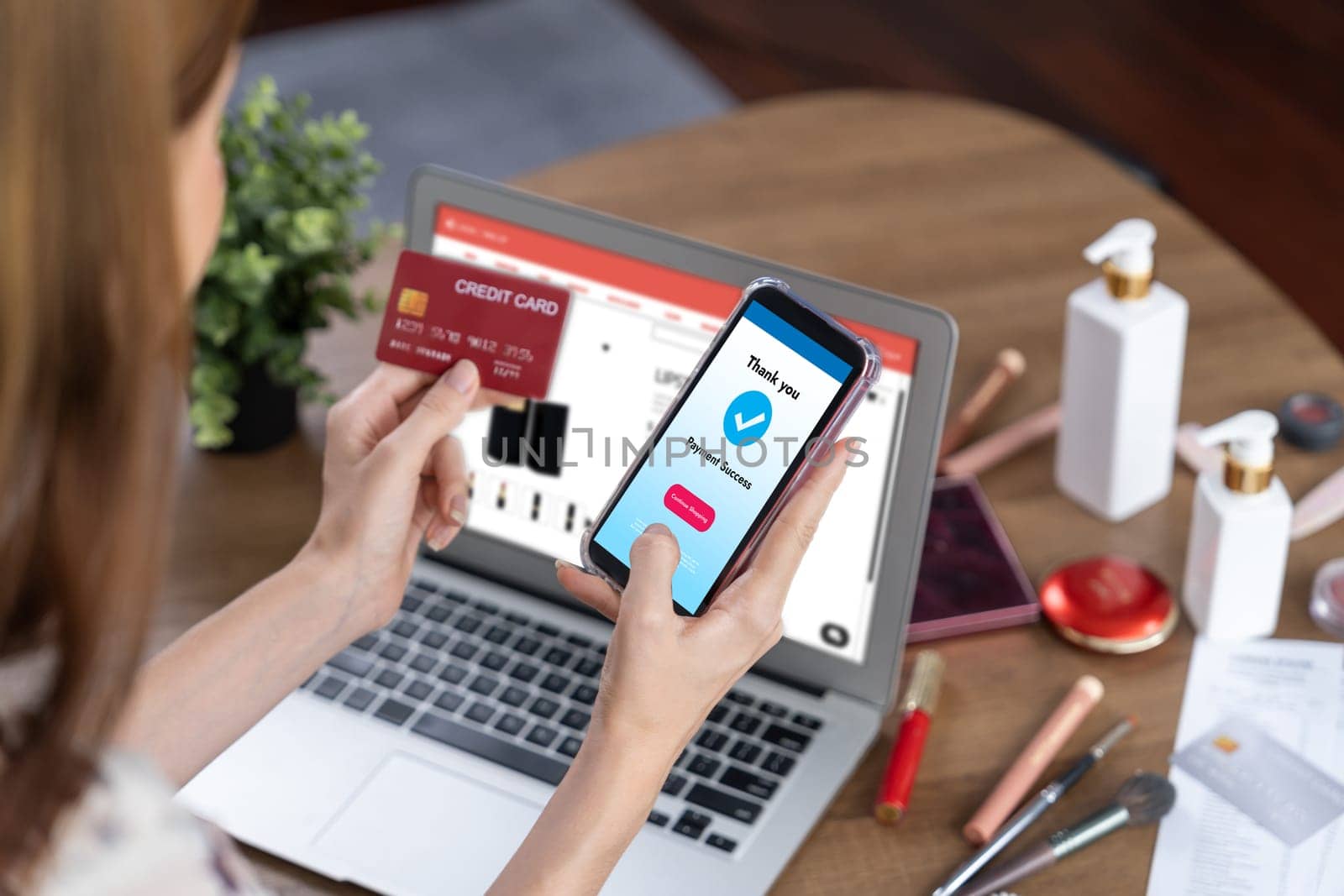 Woman shopping online on internet marketplace browsing for sale items for modern lifestyle and use credit card for online payment from wallet protected by utmost cyber security software