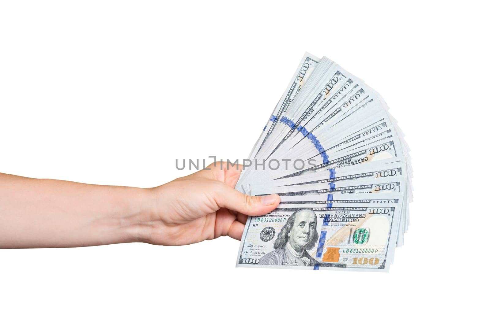 Hand holding a big stack of banknotes isolated on a white background. Wealth or loan concept. Hand holding a lot of money USA dollars. by esvetleishaya