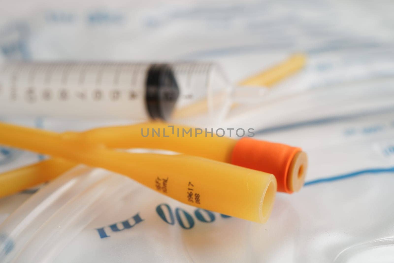 Foley catheter and urine drainage bag collect urine for disability or patient in hospital.