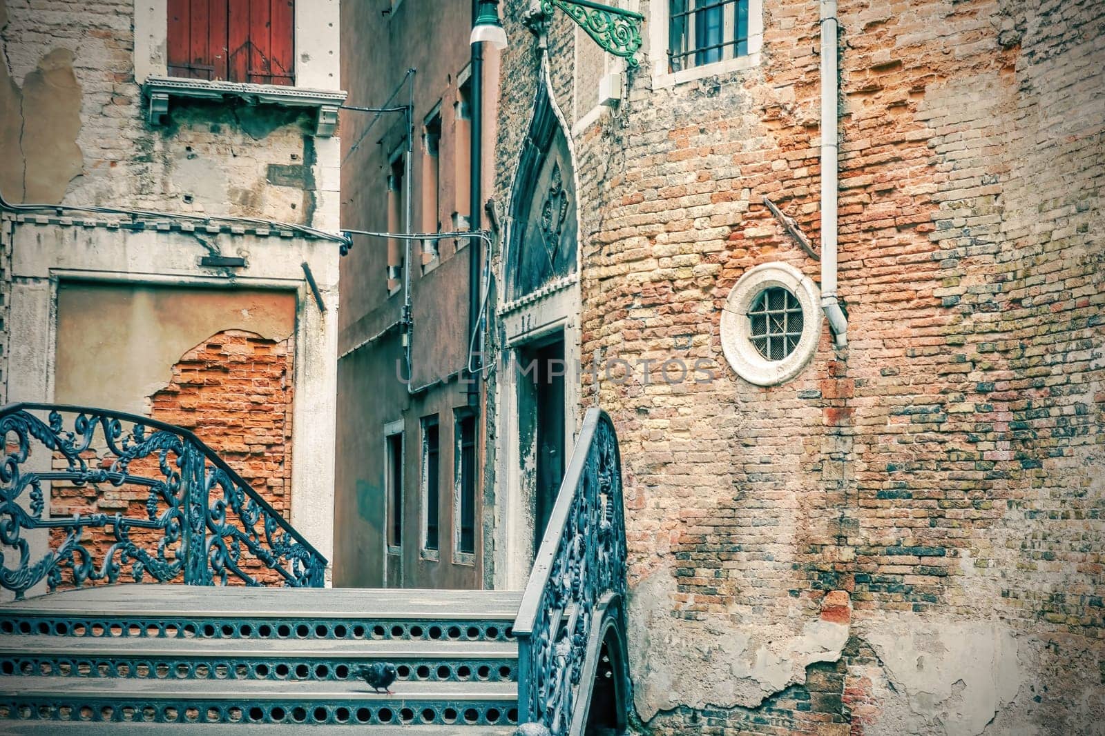 Ponte  La Malvasia Vechia in Venice. Italy. Edited as a vintage photo.