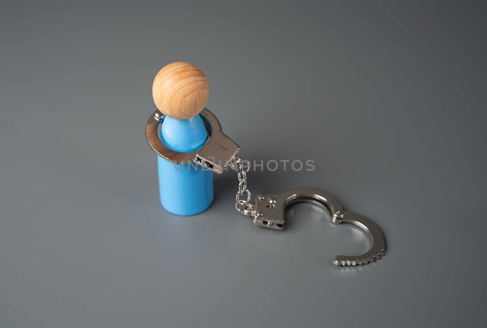 A man and open handcuffs. Liberated and free. Looking for an aggravating load or a strong, commanding hand. Psychological problems, addictions. Human rights.