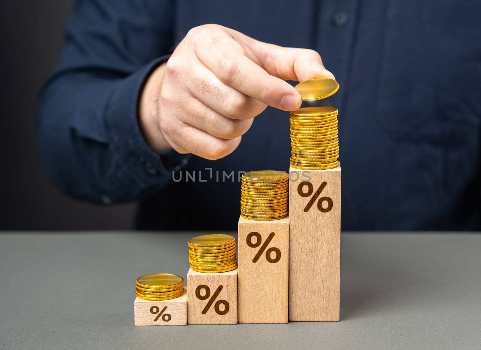 Deposits and savings. A businessman makes money on deposits and interest. Achieving a high return on investment signifies successful financial endeavors. Rising interest rates