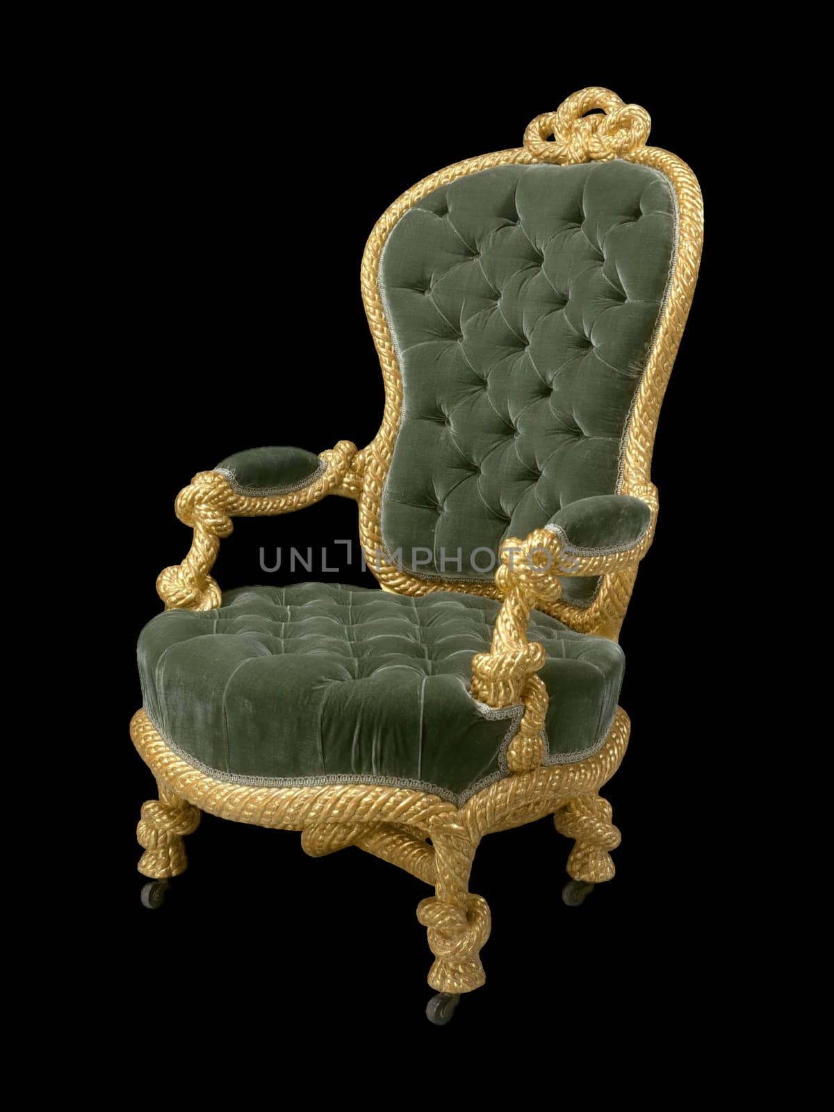 A close-up of an 19th-century green velvet armchair with gold rope detailing by A. M. E. Fournier. The armchair features tufted upholstery and ornate gold rope accents.