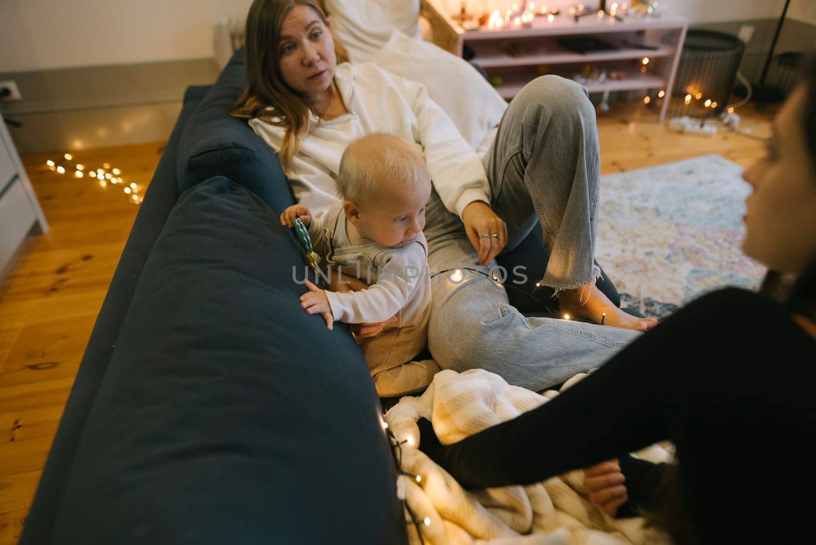 A heartwarming scene of family bonding in a cozy living room filled with soft lights and warmth, perfect for relaxation