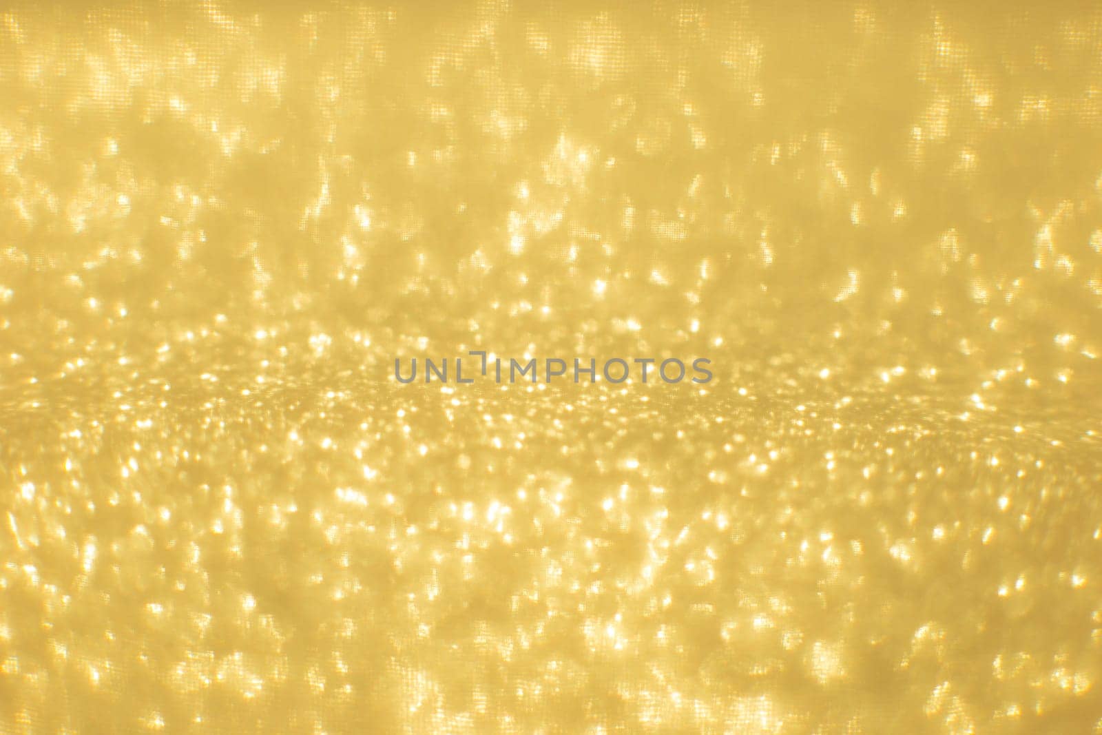 Beautiful luxury decorative abstract golden blurred background with sparkling