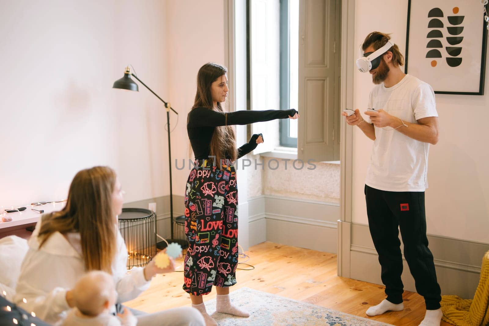 An exhilarating moment showcasing family engagement through immersive virtual reality in a modern setting