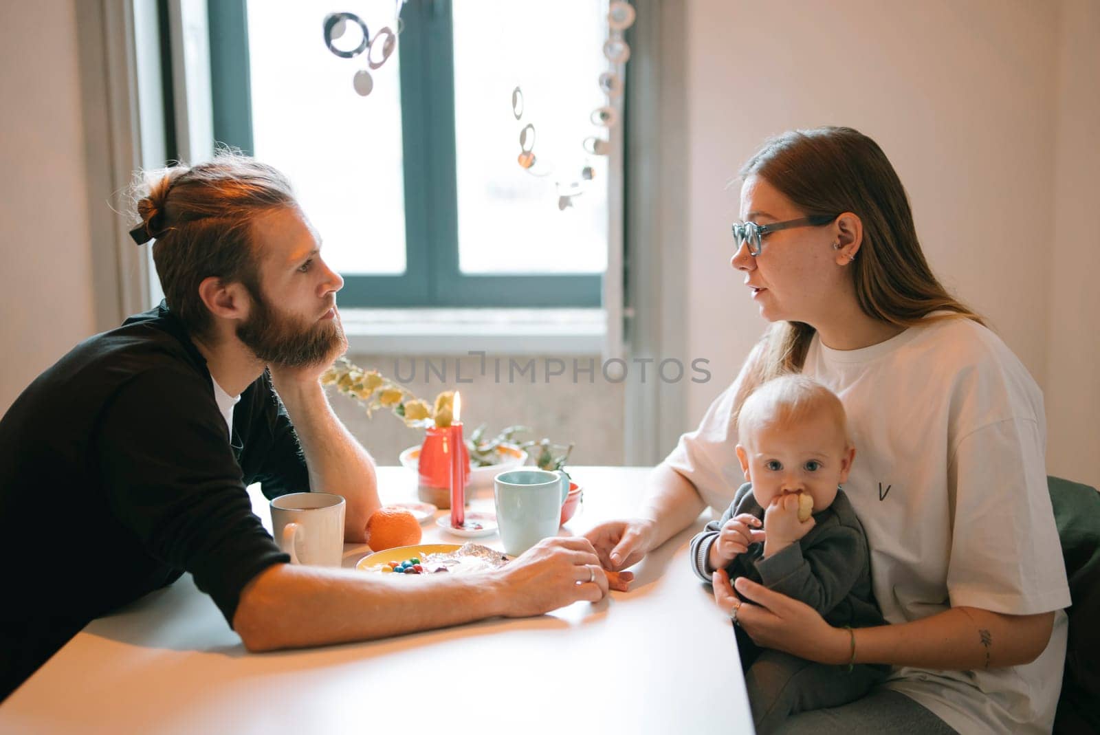 A warm and intimate scene depicting a family joyfully sharing quality time in the comfort of their home