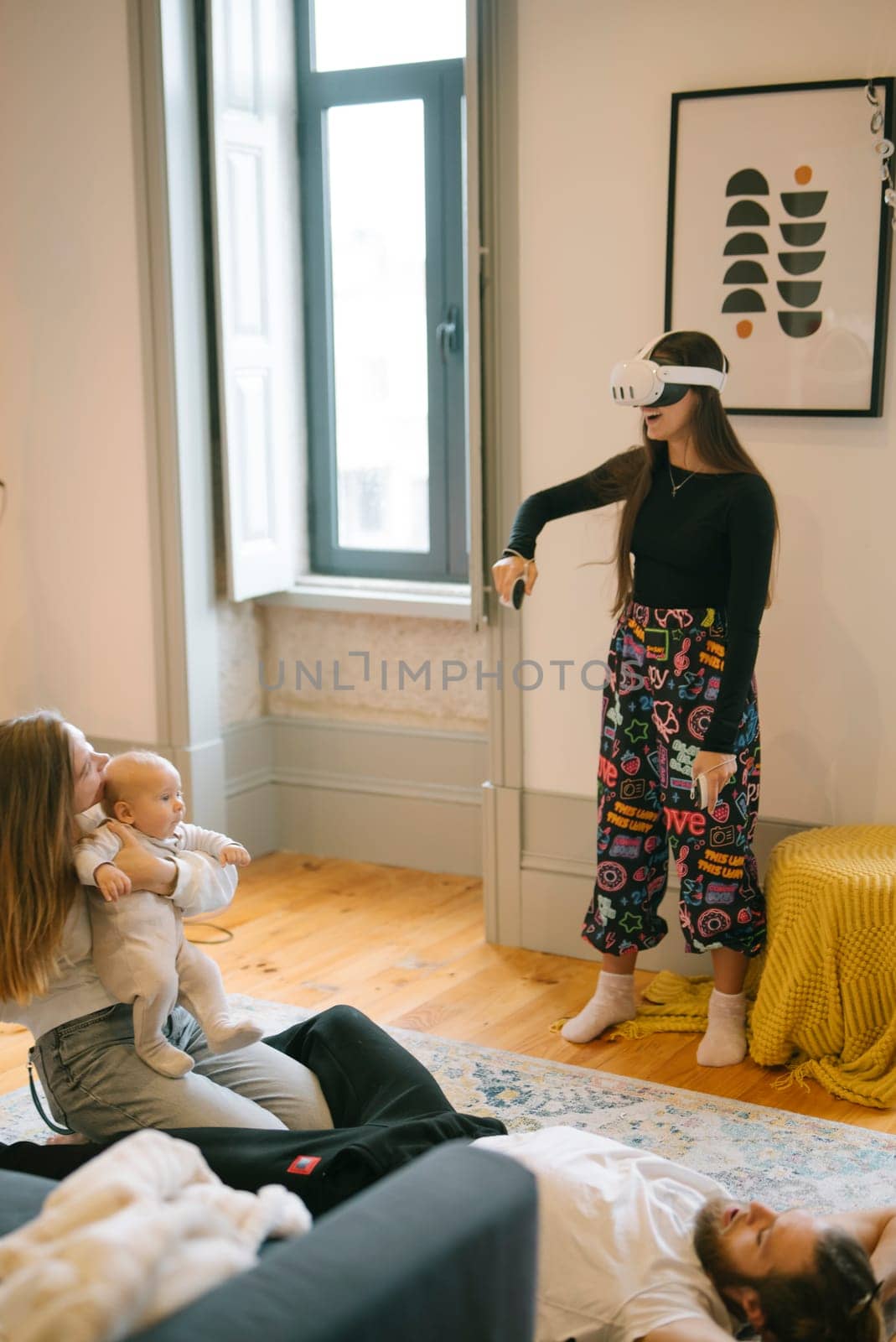 A family enjoys immersive VR experiences while spending quality time together in a stylish living room