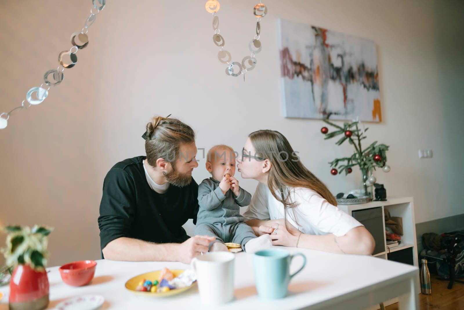 A loving family enjoys a delightful breakfast together, showcasing warmth and connection in their cozy home
