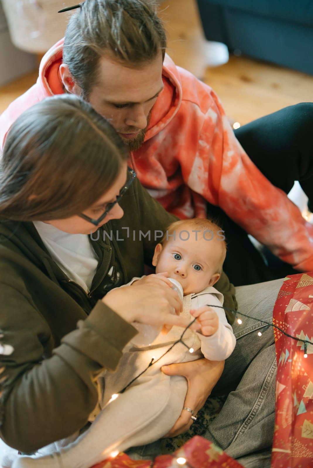 This heartwarming family scene features a baby, beautifully capturing the pure joy of togetherness and love