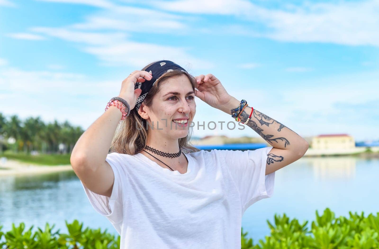 Portrait of beautiful woman with pink hair looking sideways