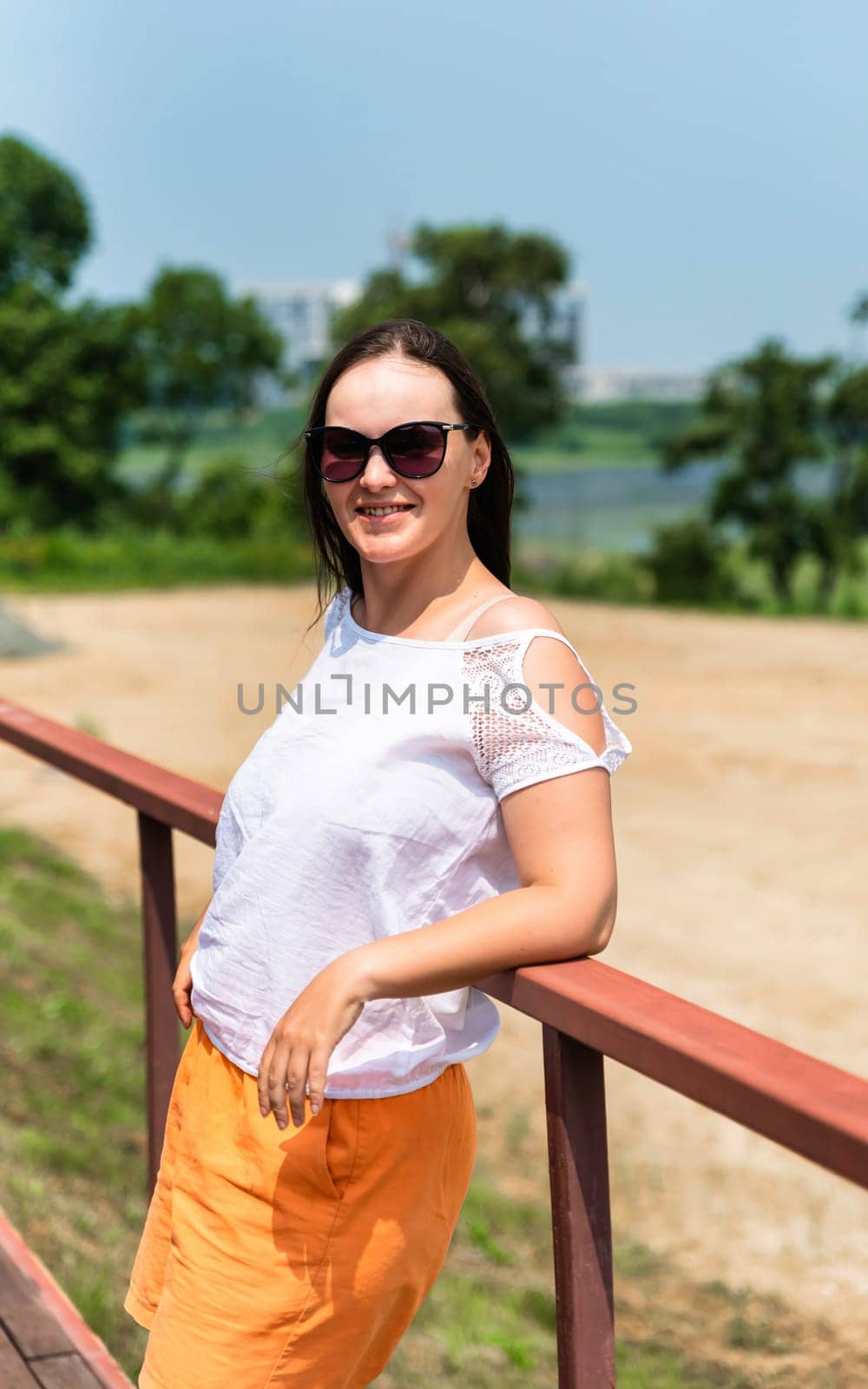 portrait of 36 years old russian woman in sunglasses on the summer day