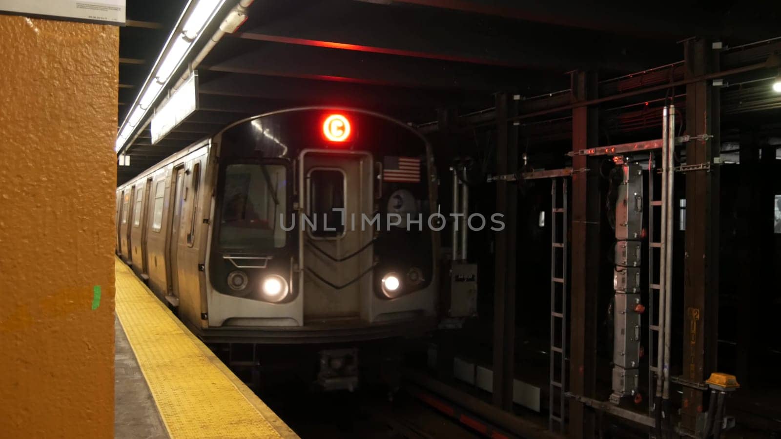 New York City, United States - 30 Aug 2023: Subway station interior, underground metropolitan platform. Metro railway passenger public transport. Manhattan railroad transportation, NYC traffic. People