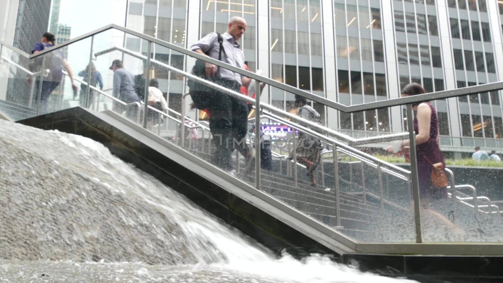 New York City, United States - 11 Sept 2023: Manhattan Midtown office buildings, Lexington avenue, United States. People pedestrian exiting subway metro station, stairs on 53 street, USA urban life.