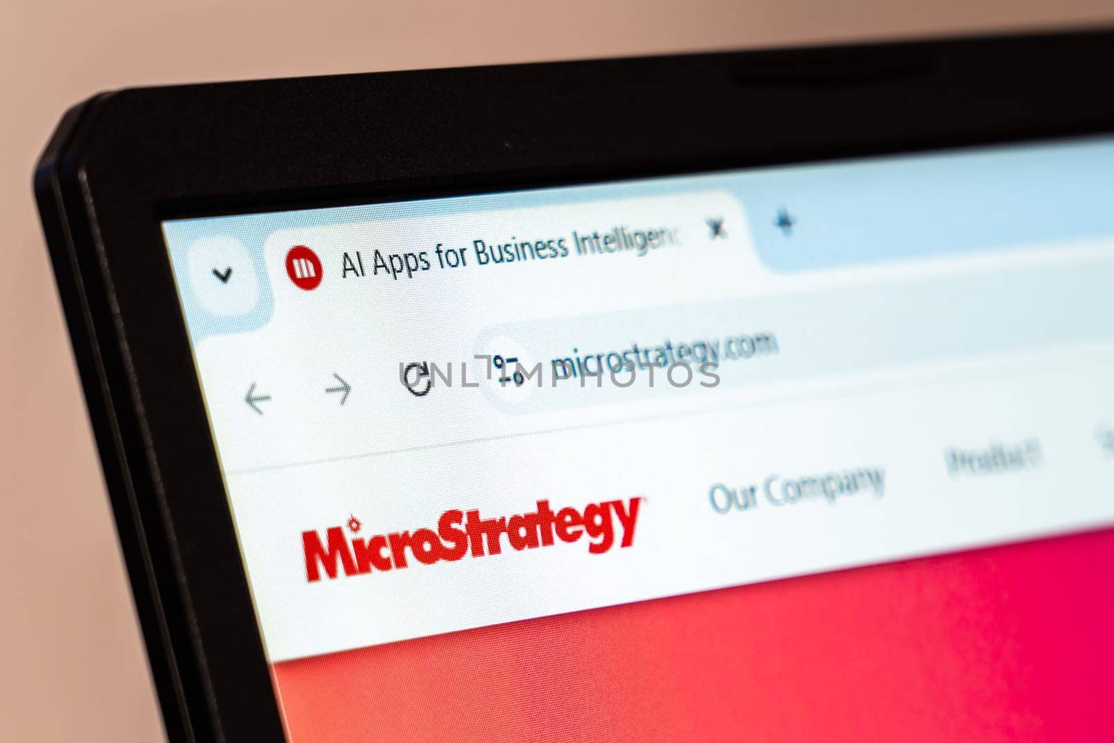 New York, USA - January 26, 2025: MicroStrategy website displayed on a laptop screen, showcasing trusted data analytics and business intelligence solutions